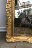 Miroir doré à la feuille d'or XVIIIème siècle