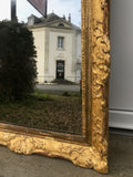 Miroir doré à la feuille d'or XVIIIème siècle