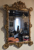 Miroir doré à la feuille d'or, milieu XIXème, 116 x 78 cm