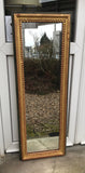 Miroir en bois doré 101 x 35 cm