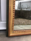 Miroir en bois doré 101 x 35 cm