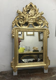 Miroir style Louis XVI doré la feuille