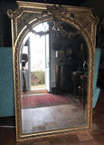 Miroir doré d'époque XIXème 174x116 cm.