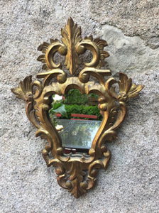 Miroir en bois sculpté début XXème